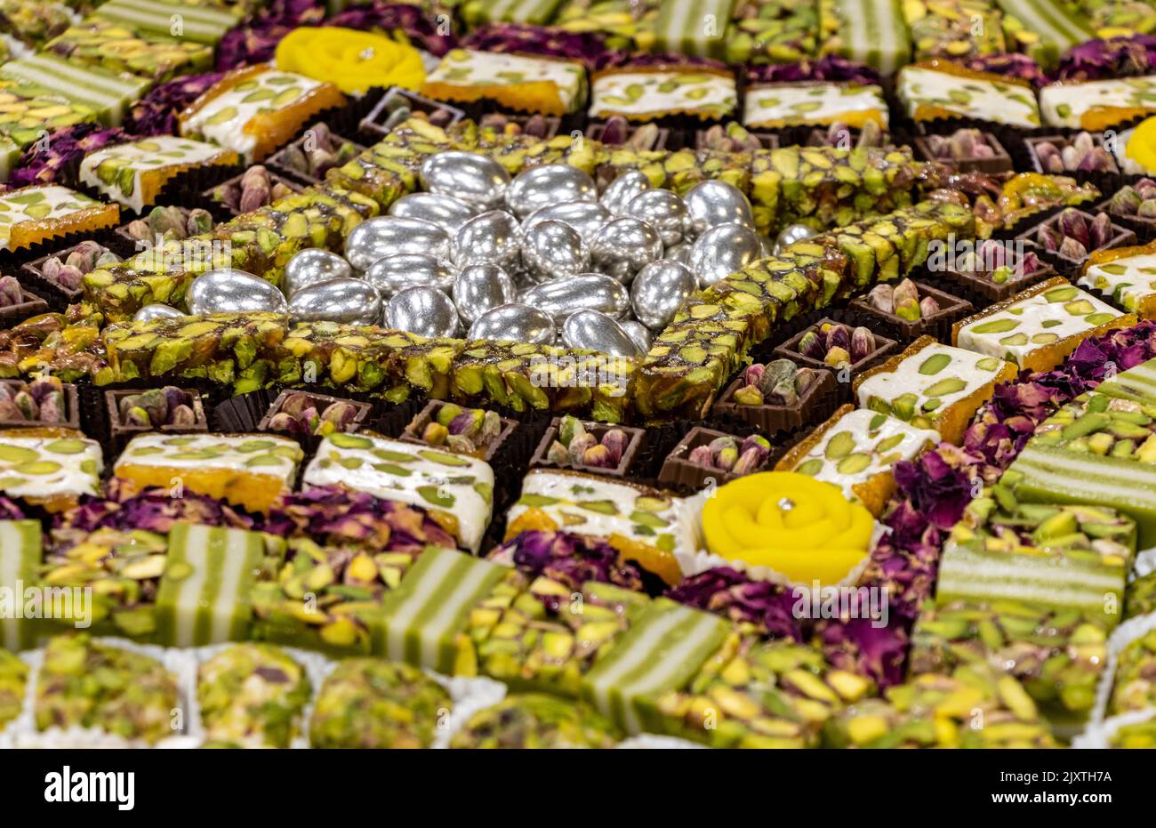 Various Turkish and middle eastern sweets in the dessert shop Stock Photo