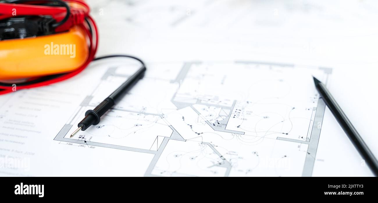 Making repairs,planning electricity project in house.Drawings,diagrams