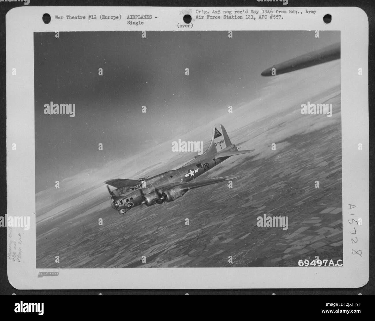 Boeing B-17 'Flying Fortress' (A/C No. 337887) Of The 91St Bomb Group Drones Over The Countryside Enroute To Bomb Enemy Installations In Europe. Stock Photo