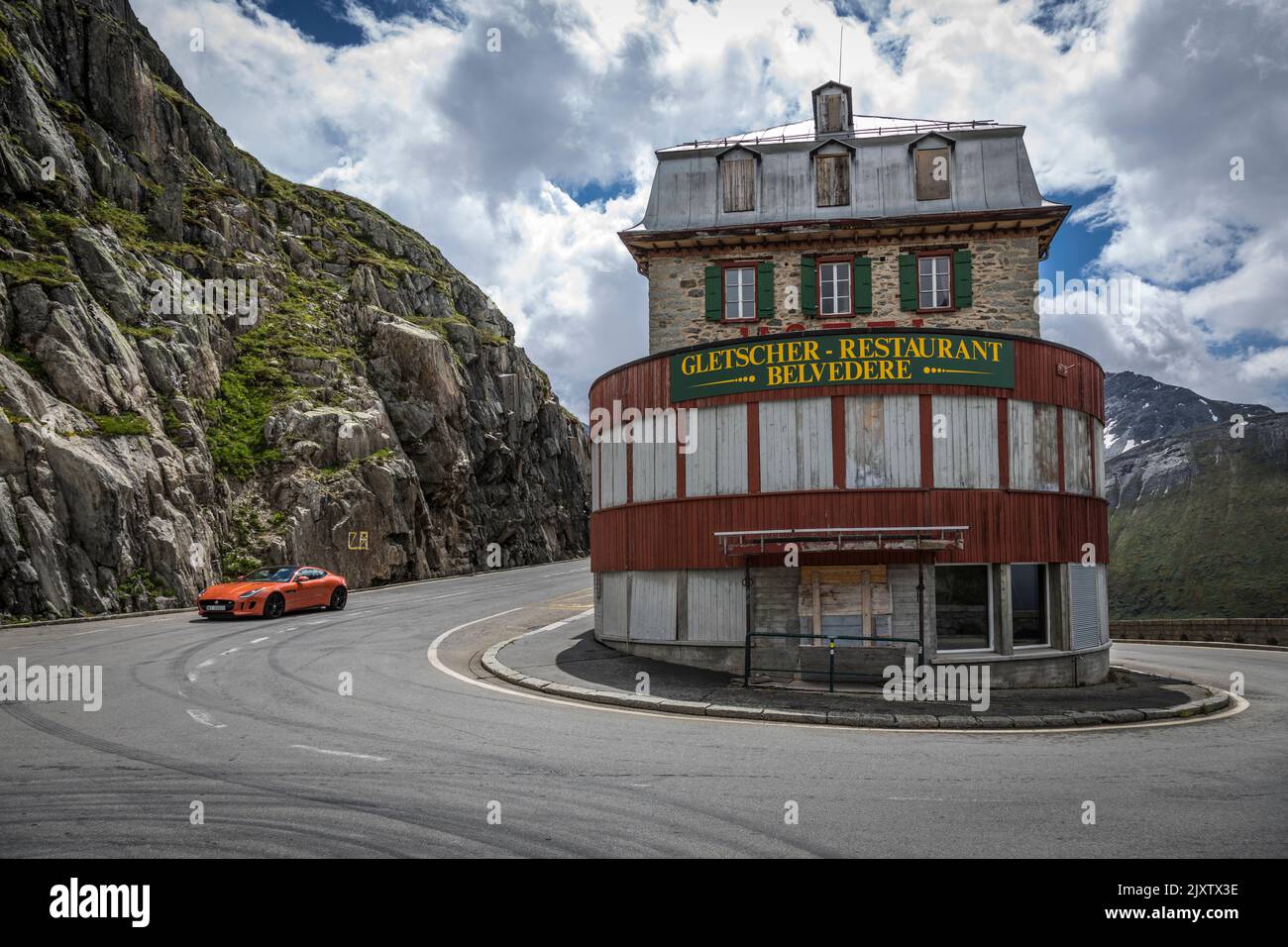 The 19th century Hotel Belvedere near the summit of the Furka Pass and close to the Rhone glacier, is now closed. Stock Photo