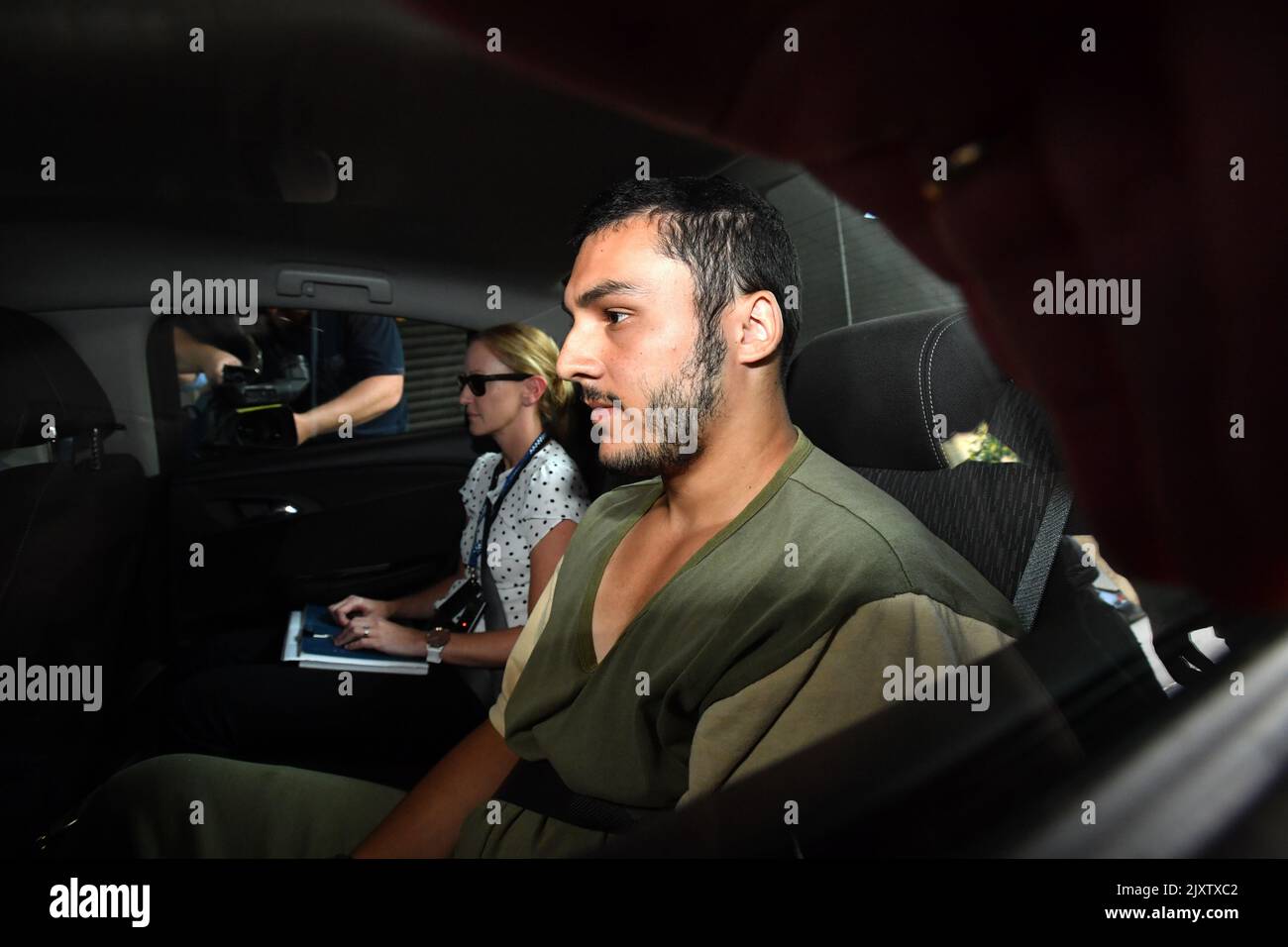 **EDITORS NOTE** Please seek your own legal advice** A suspect (right