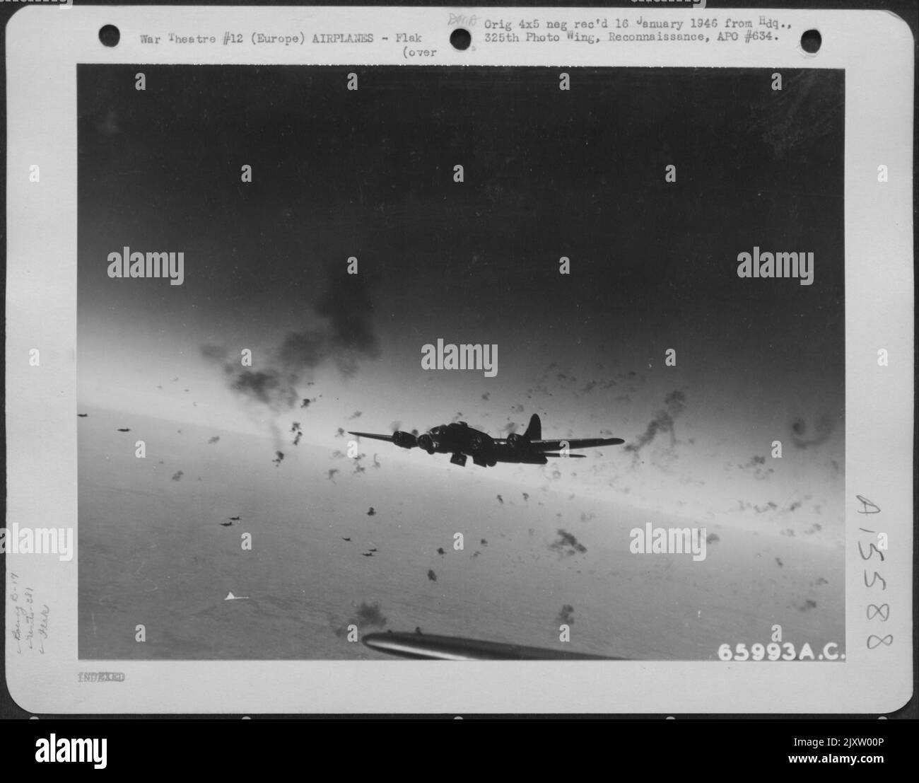 Bursts Of Deadly Flak Explode Around A Boeing B17 "Flying Fortress" Of