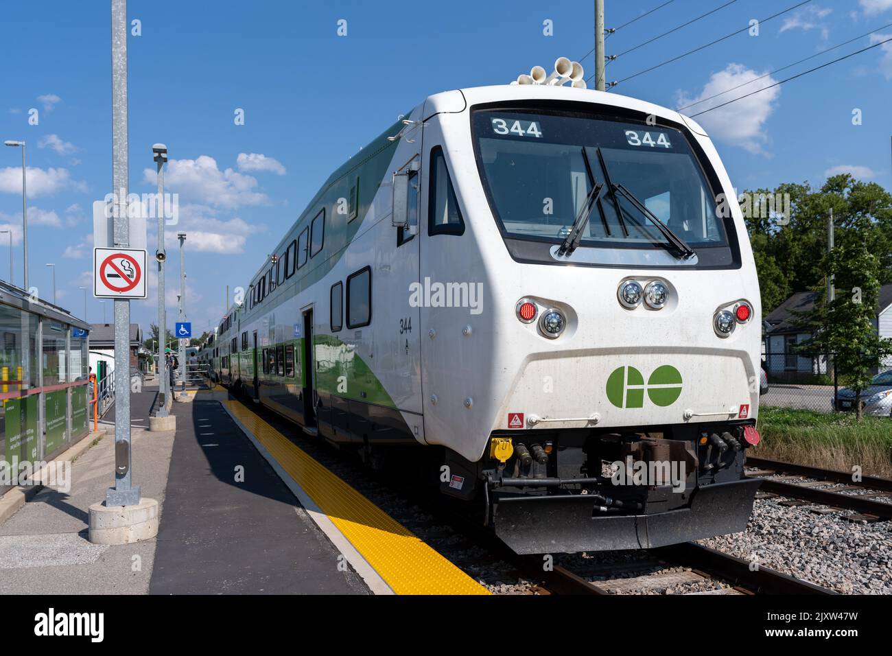 GO Transit Go Train arriving at Allandale Waterfront Station. Stock Photo
