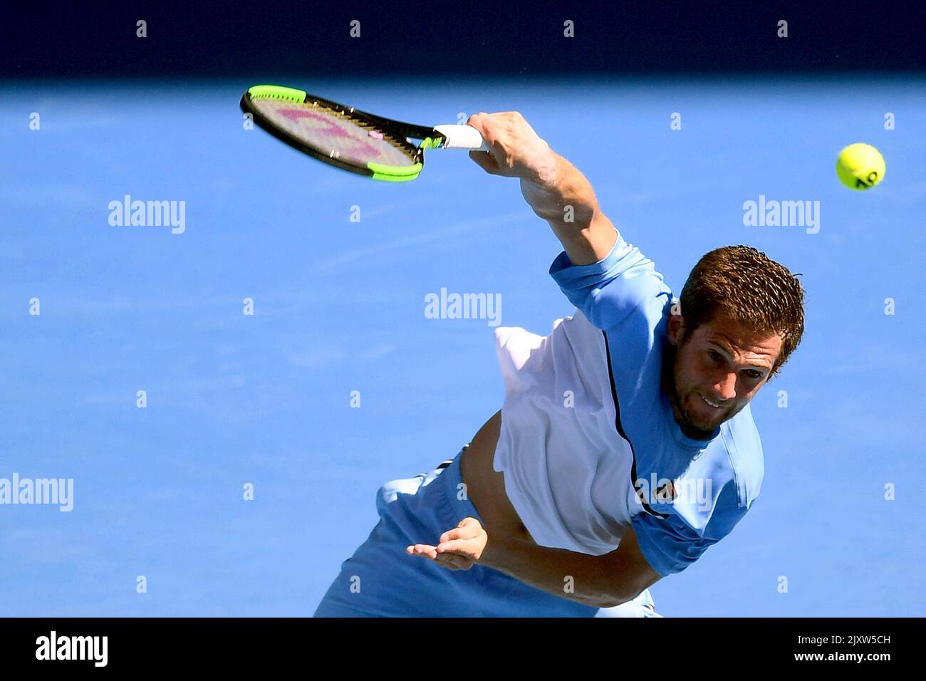 Pedro Sousa of Portugal in action against Alex de Minaur of Australia  during day one of the Australian Open tennis tournament in Melbourne,  Monday, January 14, 2019.(AAP Image/Lukas Coch Stock Photo -