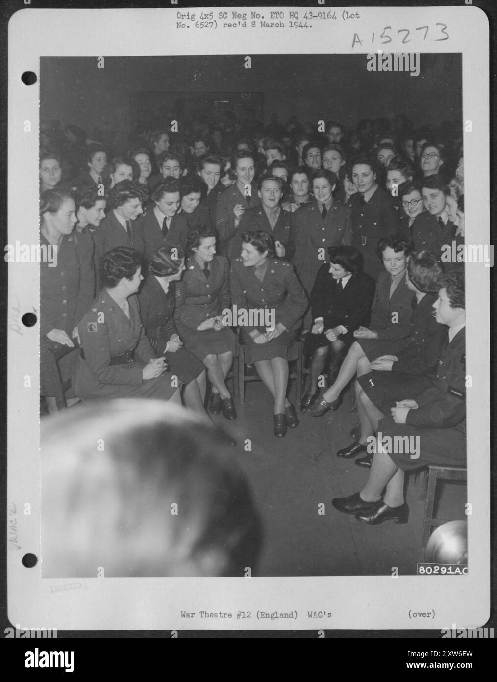 Women Of Britain, Canada And The U.S. Who Represent The Female Side Of The Army And Air Force Get Together For A Party At An 8Th Air Force Base At Widewing, England. 5 December 1943. Stock Photo
