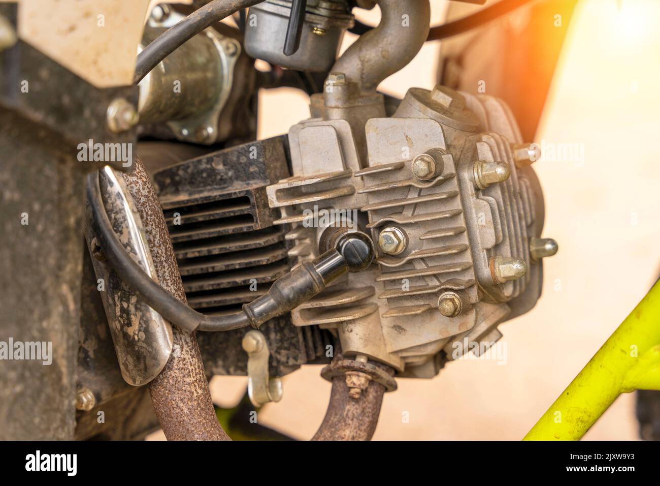 singlecylinder ATV engine. spark plug, aluminum cylinder, block head