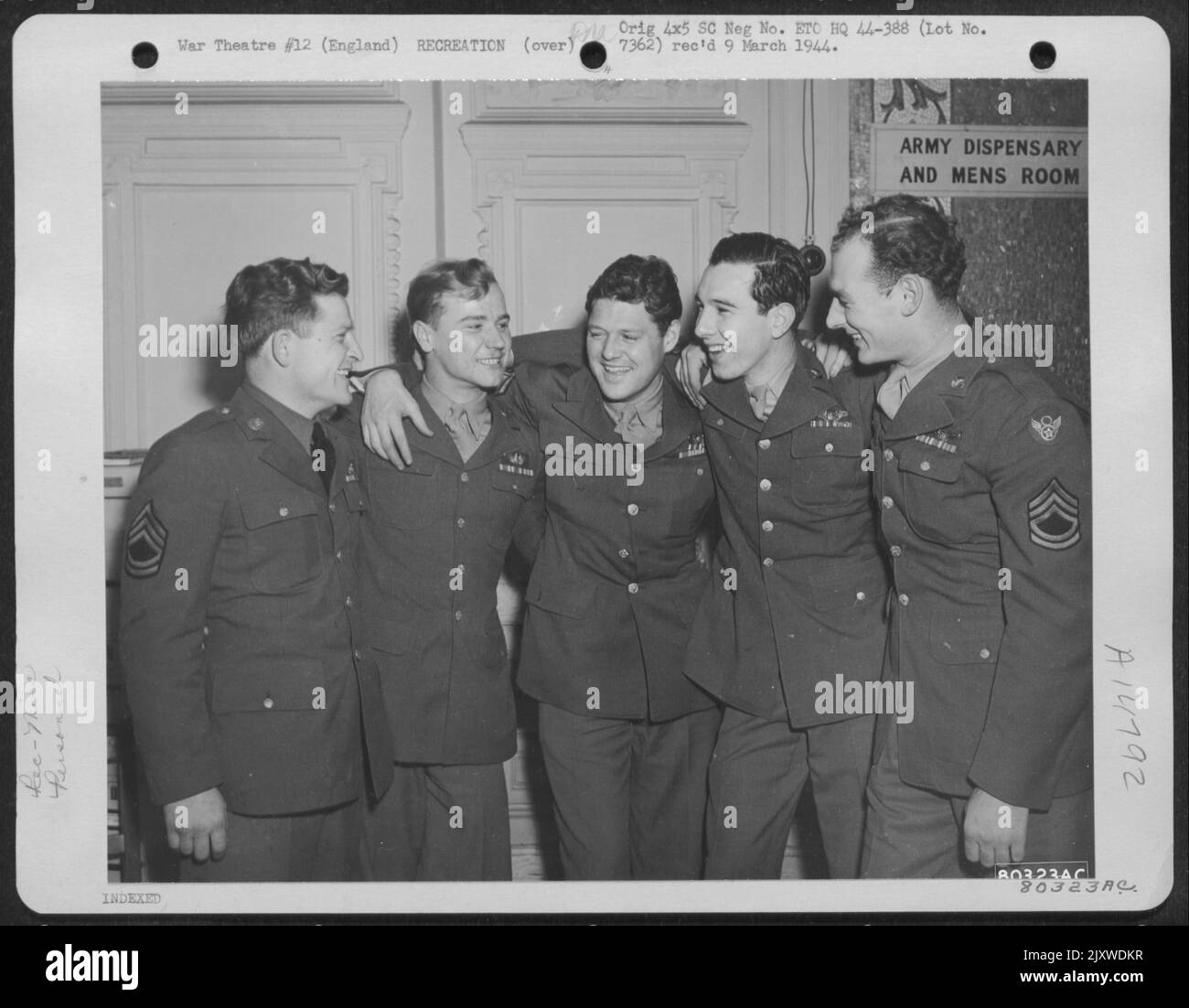 Buddies From A Squadron Of The Air Force, Who Had Finished Their Operational Missions In The Eto, Were Welcomed Into The Happy Warrior'S Club At A Party In A Red Cross Club In London, England On 12 January 1944. They Are, Left To Rigth: Sgt. Roger Palmer Stock Photo