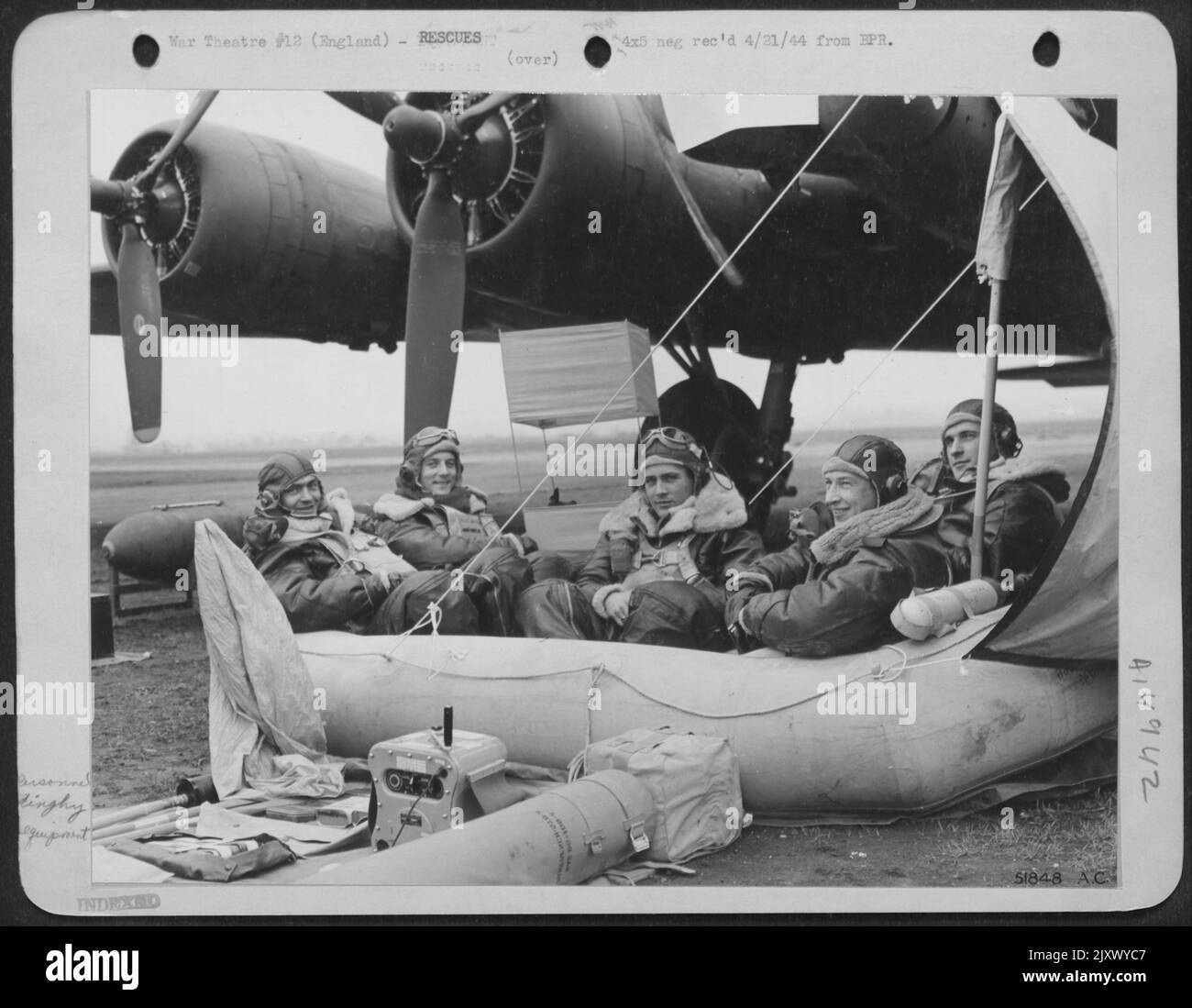 Five men in a Dingy.Left to Right: 1st Lt. Rockwell Rasmussen, Red Top