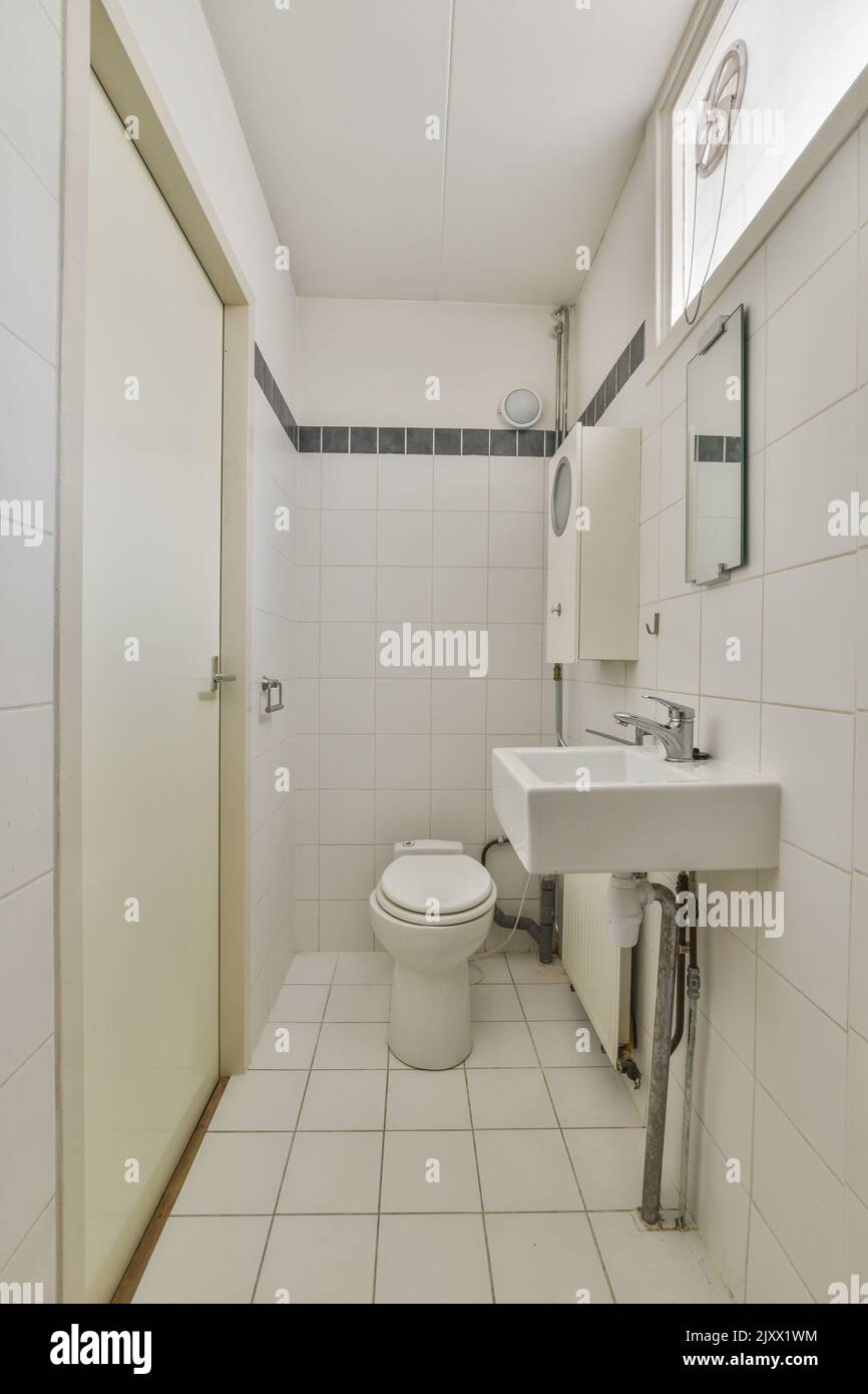 Flush toilet and shower cabin with curtain located near sink and mirrow
