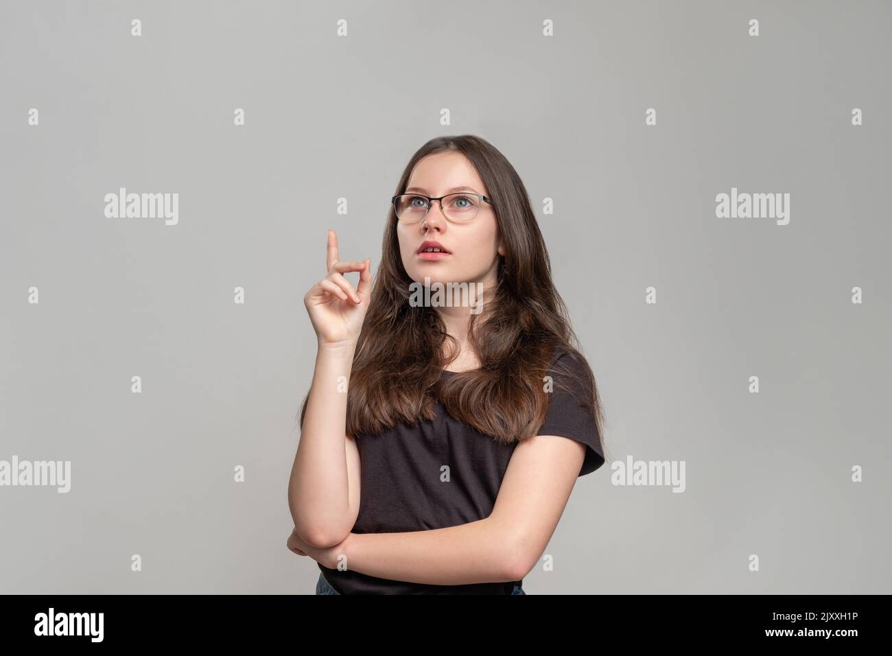 confused woman portrait doubtful lady considering Stock Photo
