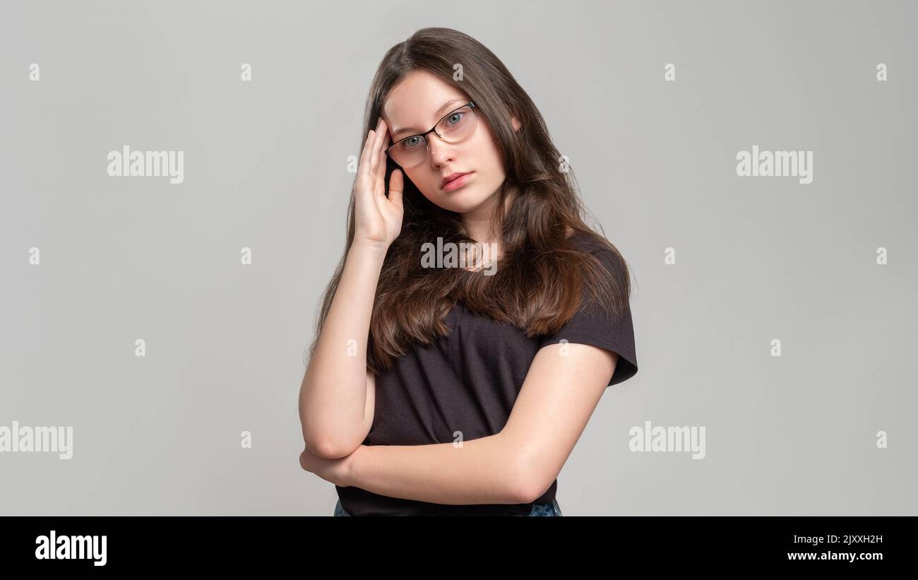concerned woman portrait trouble stress puzzled Stock Photo