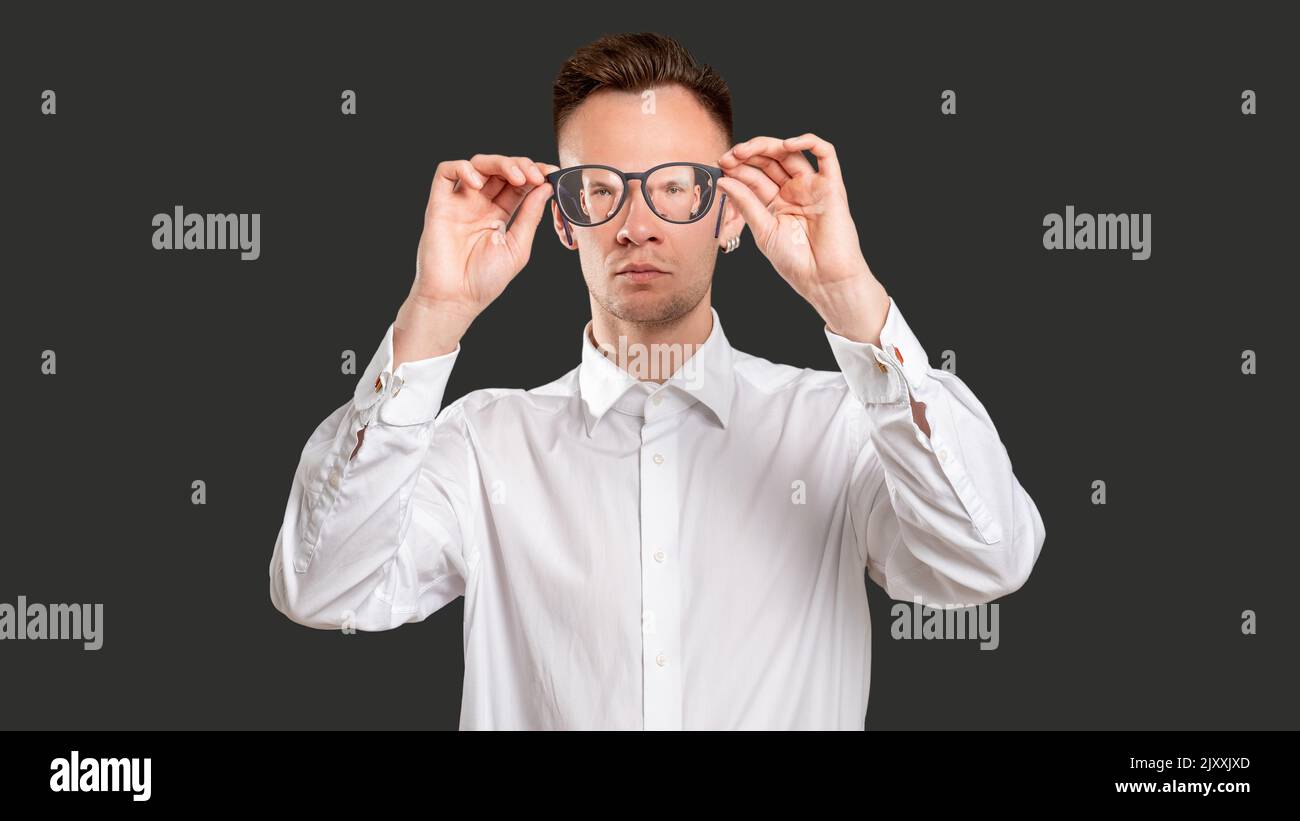 geek lifestyle optical illusion man eyeglasses Stock Photo