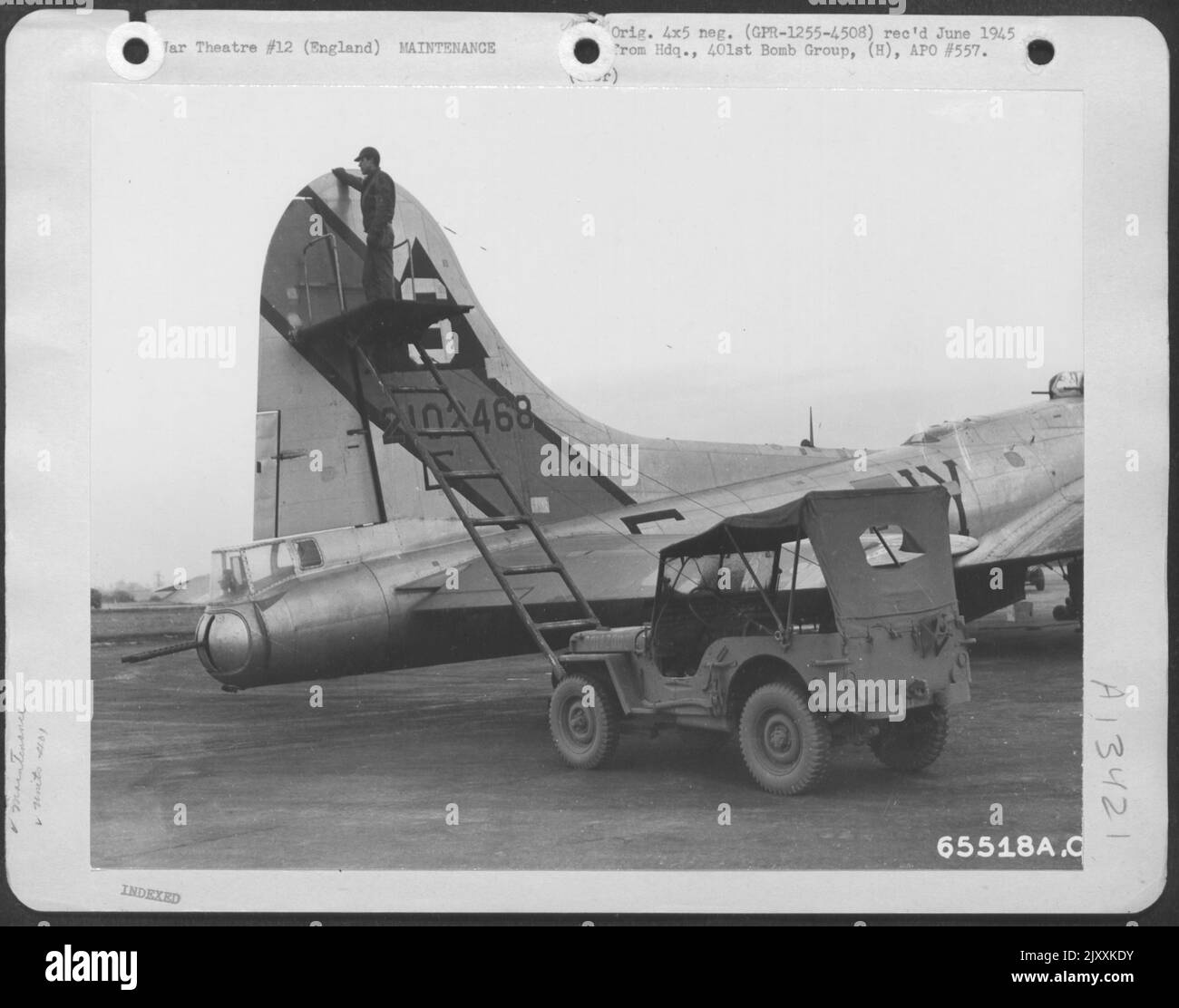 Sheet Metal Worker Inspects Tail Section Of A Boeing B-17 