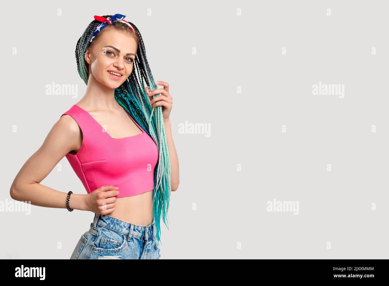 woman blue colored hair braids bright dyed dreads Stock Photo