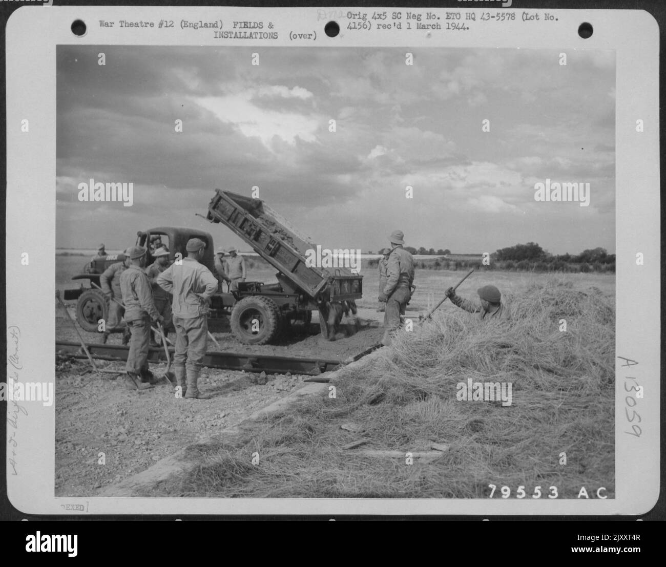 A Crew Of Engineers Pours Concrete For The Runways During The Construction Of An Airfield At Molesworth, England. 7 July 1943. Stock Photo