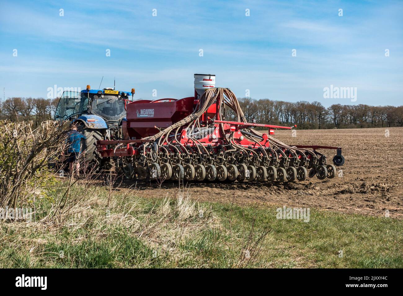 Weaving Machinery GD4300T Seed Drill and tractor in Leicestershire farm field, UK Stock Photo