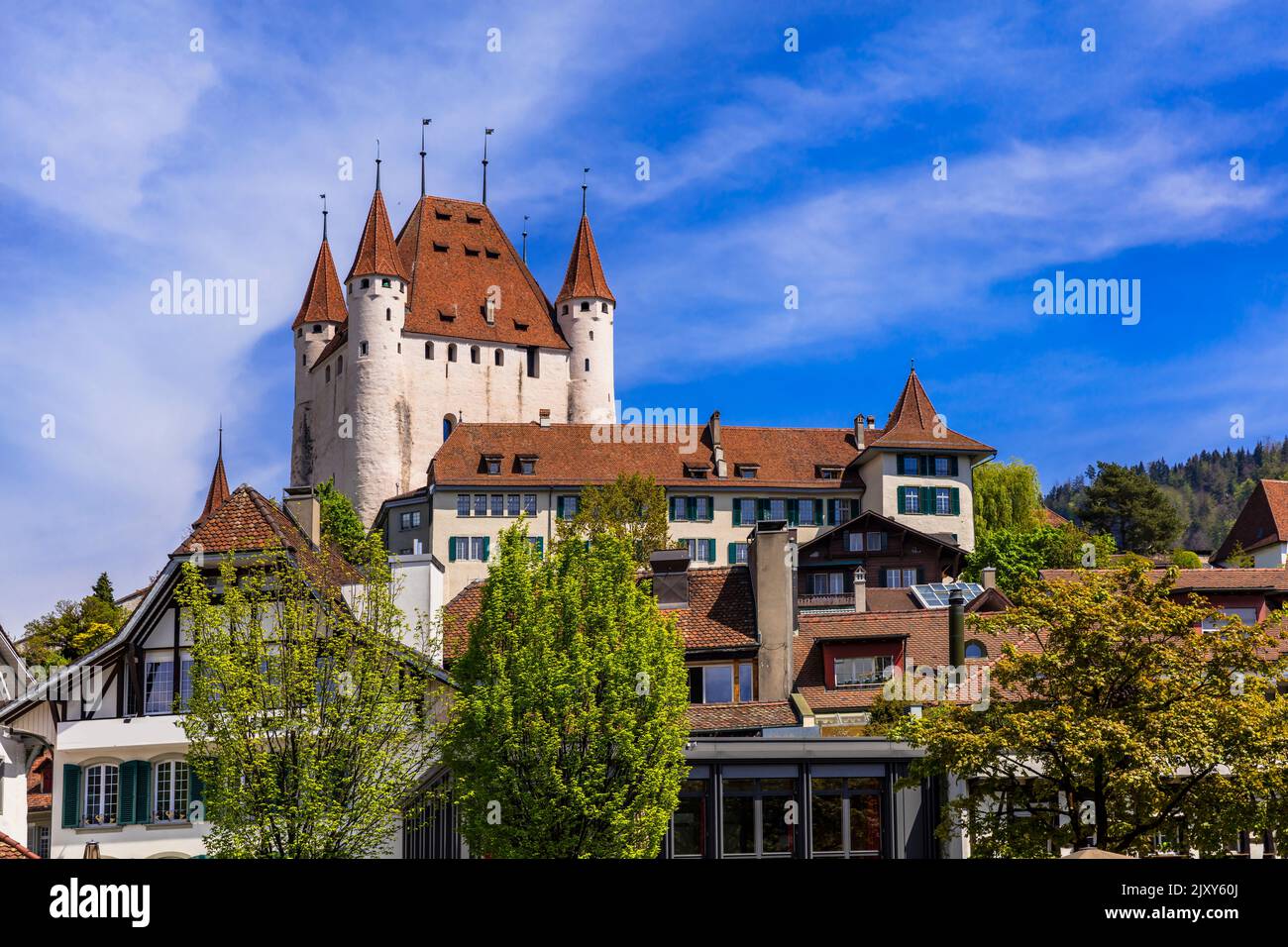 Switzerland travel and landmarks. Famous Thun lake and Thun town with medieval castle popular tourist destination Stock Photo
