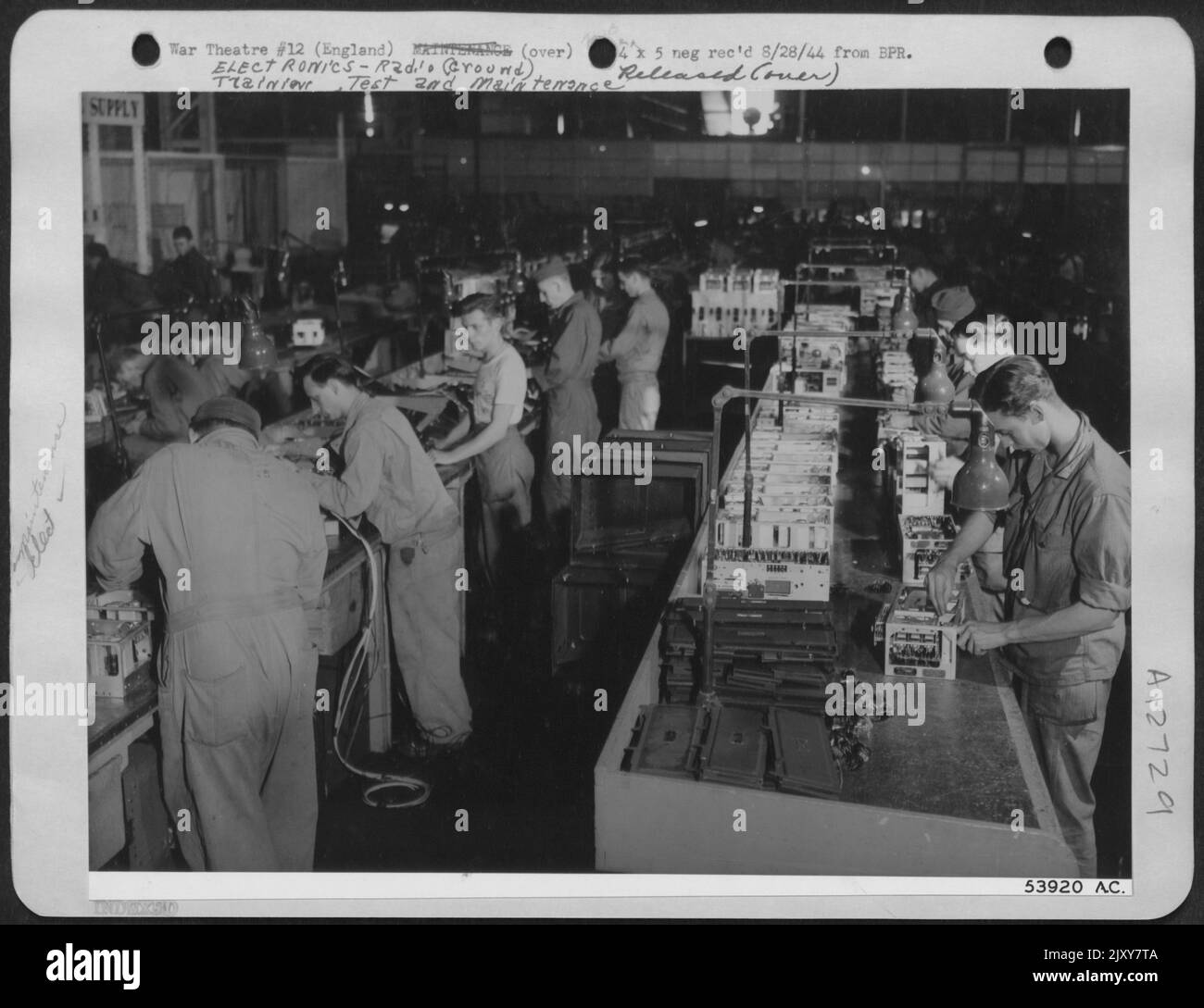 RADIOS-In this large inspection shop at an 8th AF base depot in England ...