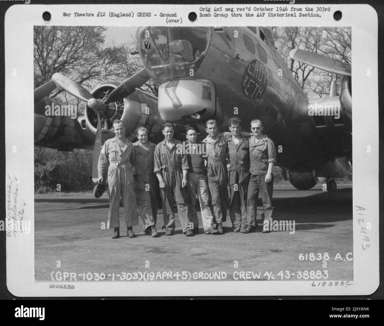 Ground Crew Of The Boeing B-17 'Flying Fortress' 'Lady Beth' Of The 303Rd Bomb Group, Based In England. 19 April 1945. Stock Photo