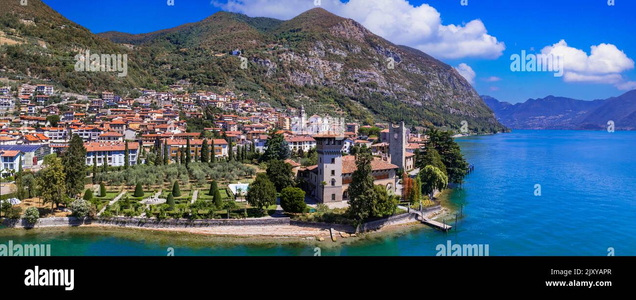 Romantic beautiful lake Iseo, aerial view of Predore idyllic village surrounded by mountains. Italy , Bergamo province Stock Photo