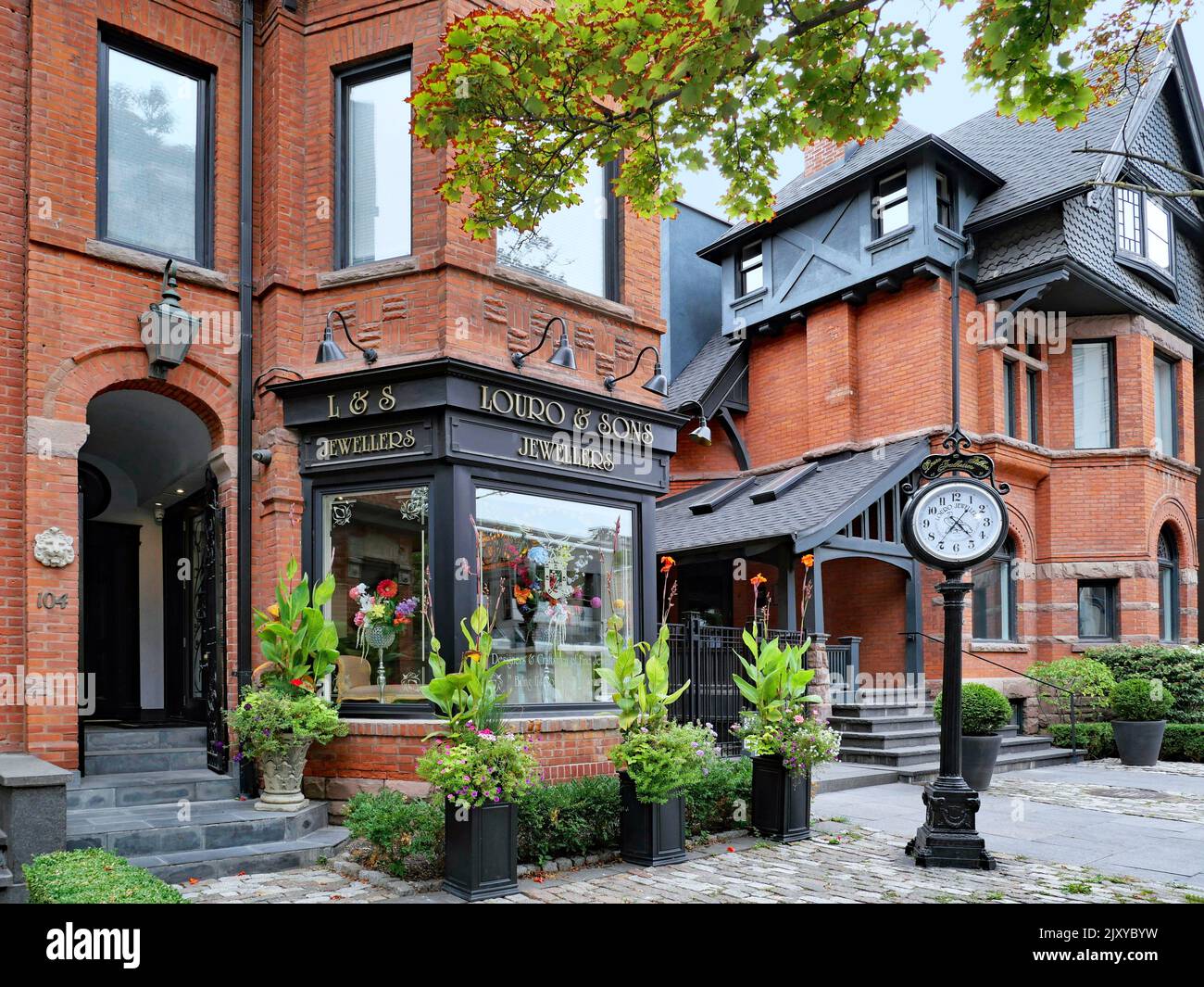 Toronto, Canada - September 2022:  The Yorkville Village area has old houses that have been converted into elegant boutiques. Stock Photo