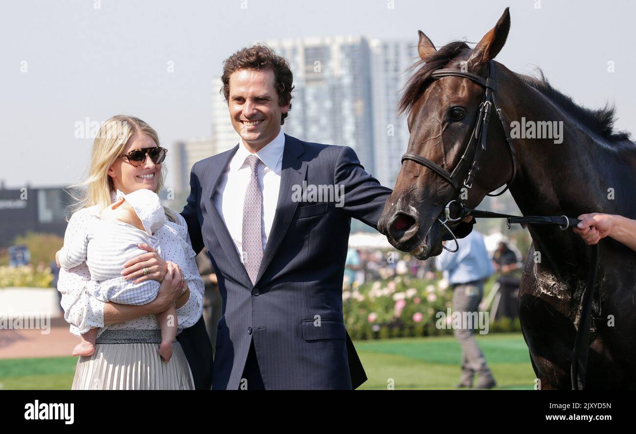 Trainer Matt Cumani with wife Sarah and son Masssimo after jockey Jordan  Childs rode Wetakemanhattan to victory in race 5, Grand Classic Final  during the All Star Mile Raceday at Flemington Racecourse