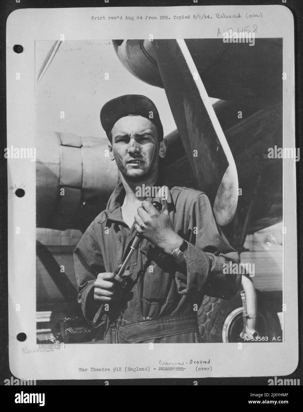 ENGLAND-Sgt. Arthur Dwyer, ground crew member of a B-24, is a very