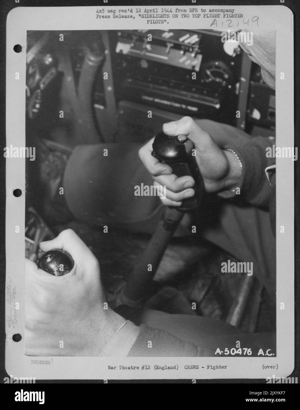 ENGLAND-Shown here is the trigger-finger technique of Capt. Don S. Gentile, USAF fighter ace, when firing on Nazi aircraft. Stock Photo