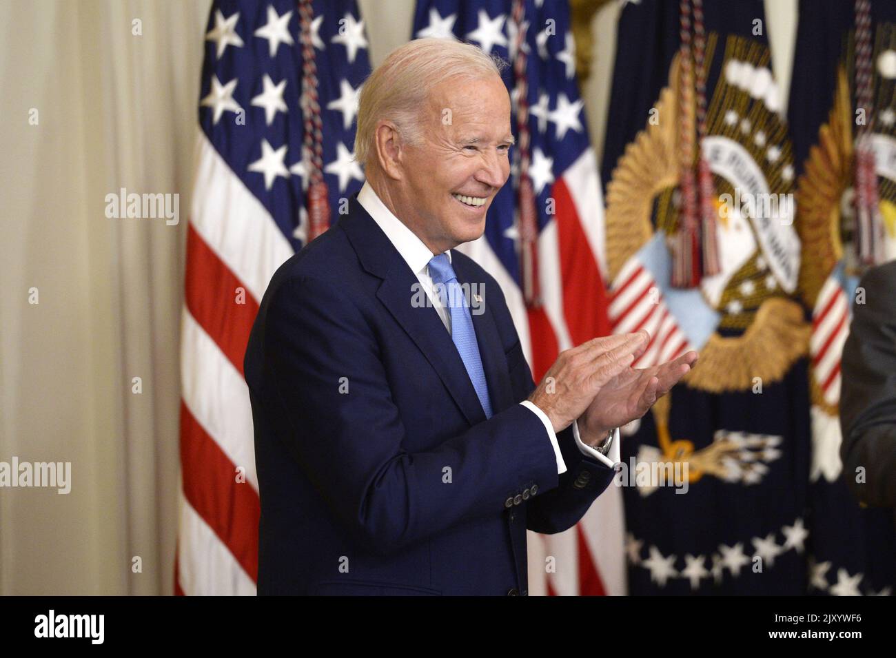 Washington, United States. 07th Sep, 2022. President Joe Biden claps during a portrait unveiling ceremony for Former President Barack Obama and former First Lady Michelle Obama in the East Room of the White House in Washington, DC on Wednesday, September 7, 2022. Photo by Bonnie Cash/UPI Credit: UPI/Alamy Live News Stock Photo