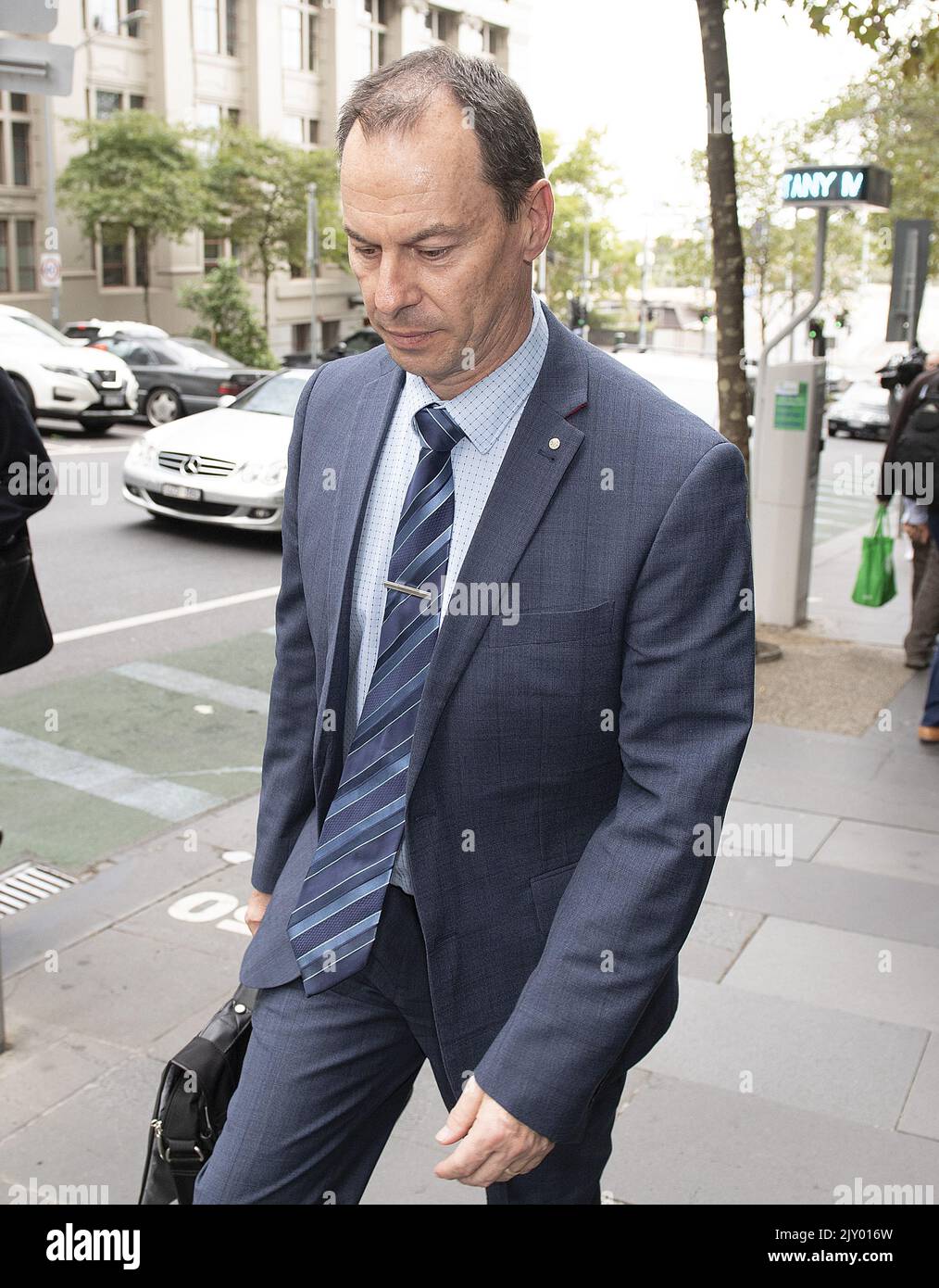 Witness Jeff Pope leaves the Victorian Royal Commission in Melbourne