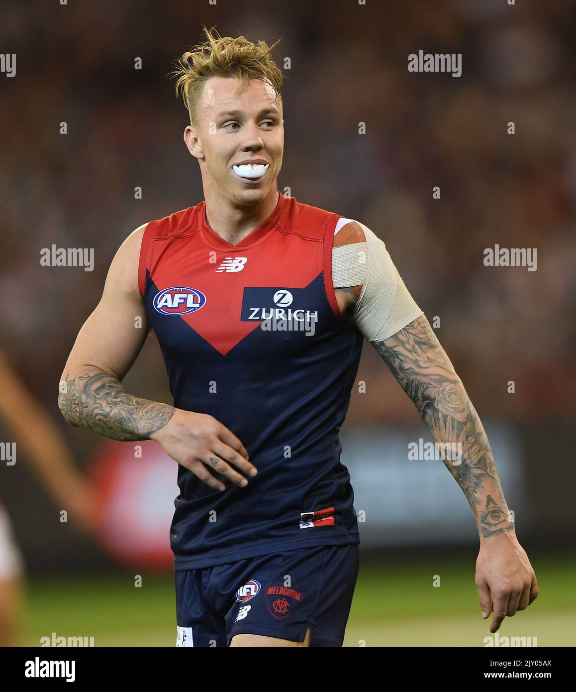 James Harmes of the Demons reacts during the Round 3 AFL match between the Melbourne Demons and
