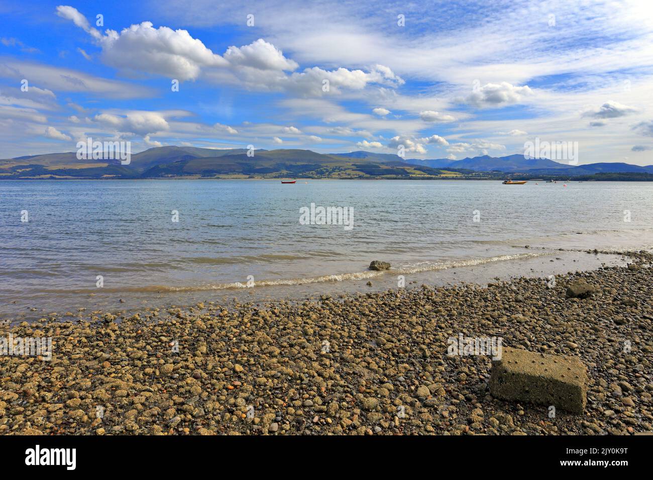 Snowdonia across the Menai Strait from Beaumaris shoreline, Isle of Anglesey, Ynys Mon, North