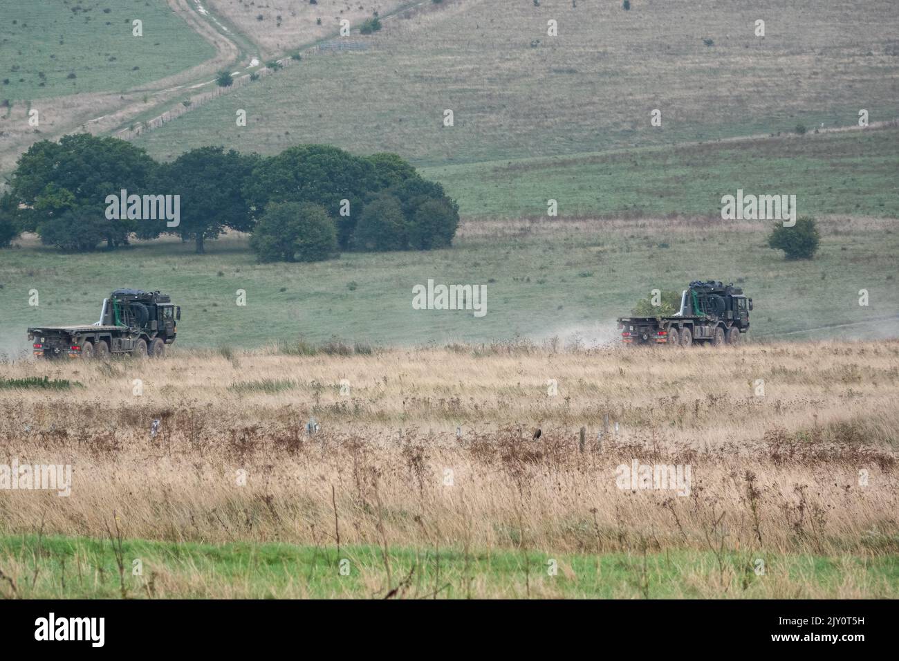 British army MAN SV 8x8 EPLS Heavy Utility Trucks in action on a military exercise Stock Photo