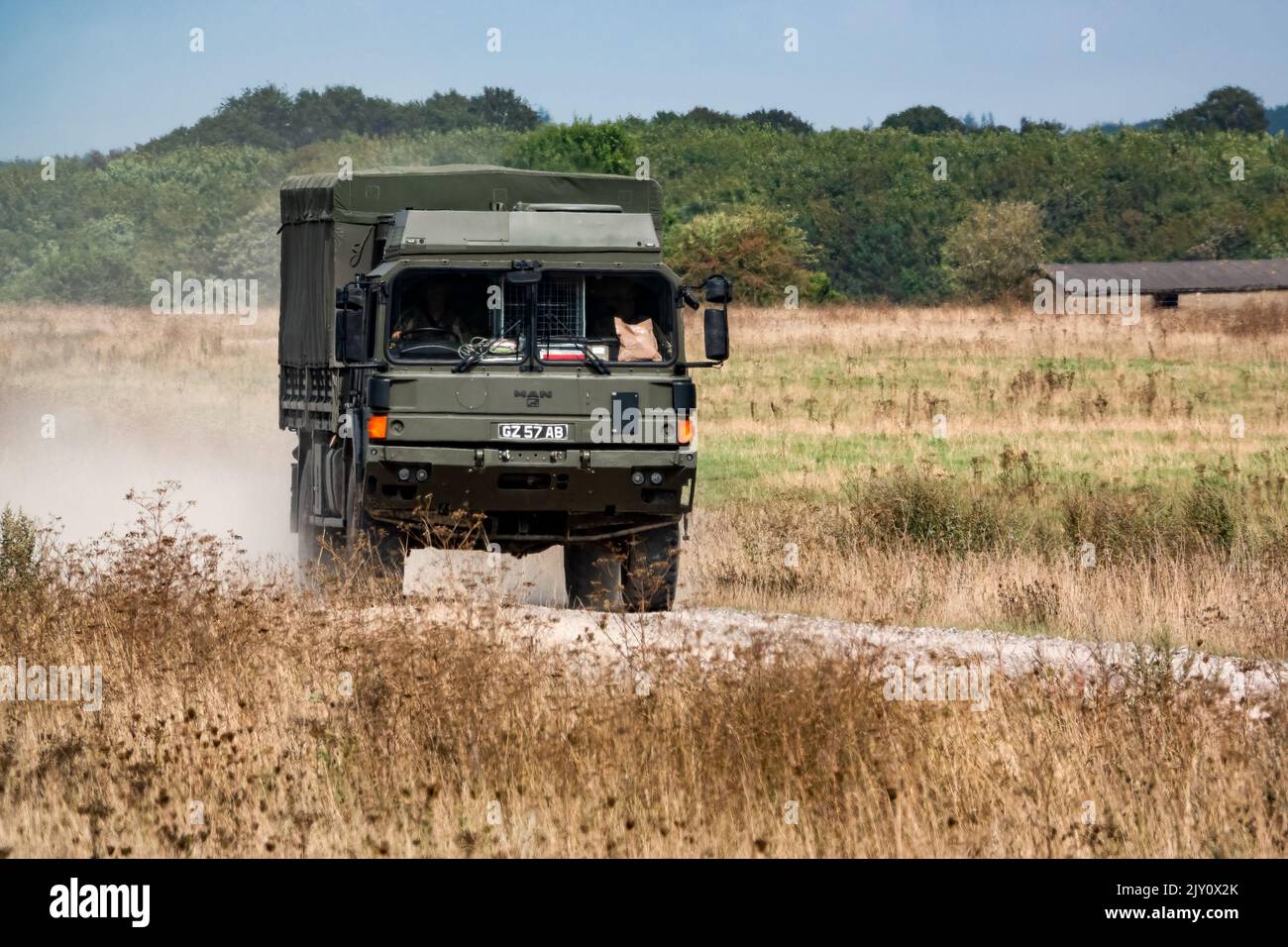 British army MAN HX60 4x4 Heavy Utility Truck in action on a military exercise Stock Photo