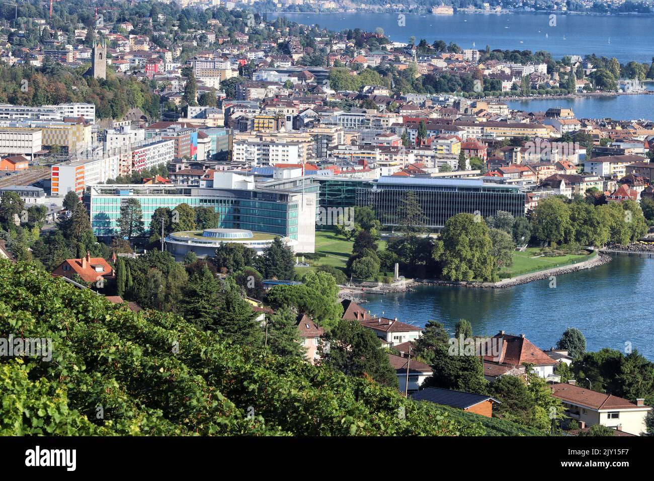 Vevey, Switzerland - September 4, 2022: Nestle headquarters office buildings are seen from the top of the mountain. Stock Photo