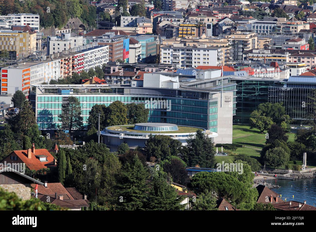 Vevey, Switzerland - September 4, 2022: Nestle headquarters office buildings are seen from the top of the mountain. Stock Photo
