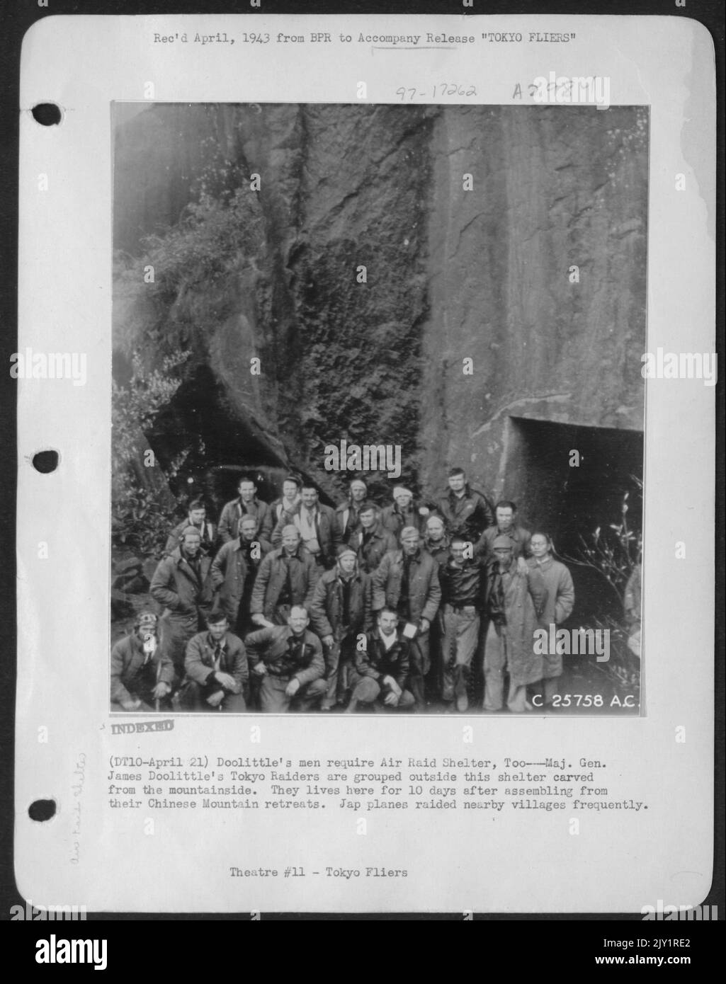 Doolittle's men require Air Raid Shelter, Too---Maj. Gen. James Doolittle's Tokyo raiders are grouped outside this shelter carved from the mountainside. They lives here for 10 days after assembling from their Chinese Mountain retreats. Stock Photo