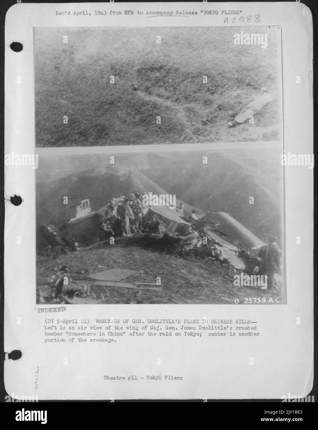 WRECKAGE OF GEN. DOOLITTLE's PLANE IN CHINESE HILLS--Left is an air view of the wing of Maj. Gen. James Doolittle's crashed bomber 'Somewhere in China' after the raid on Tokyo; center is another portion of the wreckage. Stock Photo