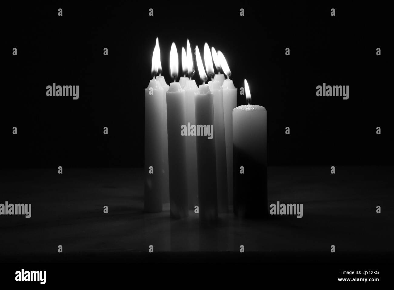 Burning Candles in The Dark Photograph Stock Photo Alamy
