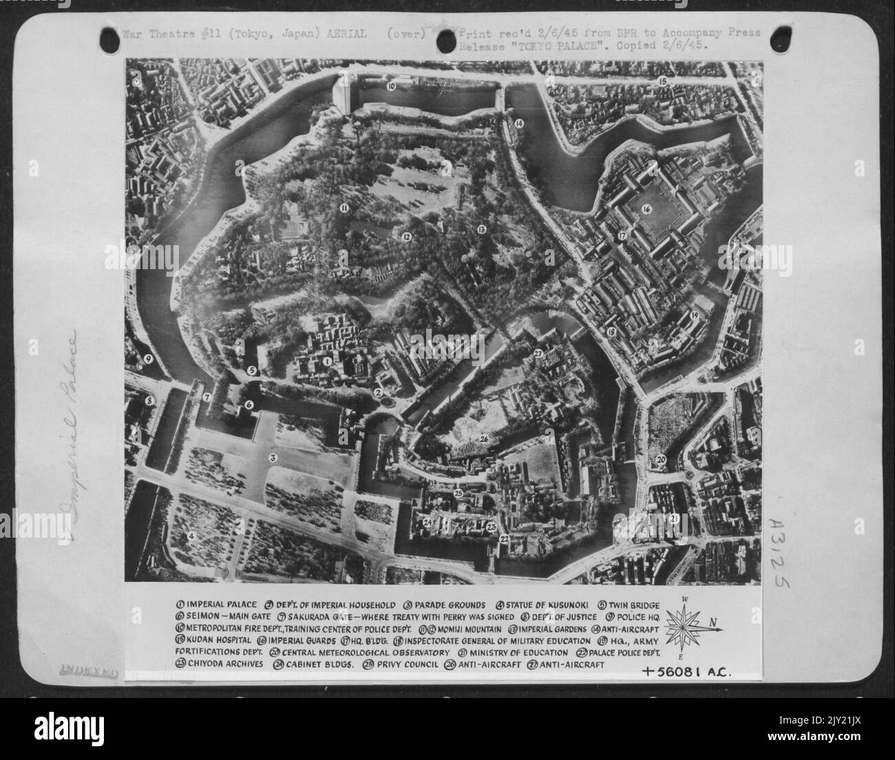 TOKYO PALACE-The Imperial Palace, Tokyo, as seen thru the camera of a 21st Bomber Command B-29 Superfortress. This remarkable photograph shows the palace and surrounding buildings. Note the moat that completely surrounds the entire area. Stock Photo