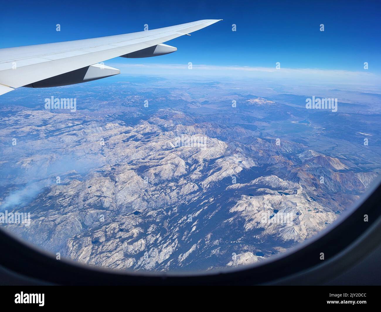 Aircraft flying over the landscape flight above the Rocky Mountains near Denver Stock Photo