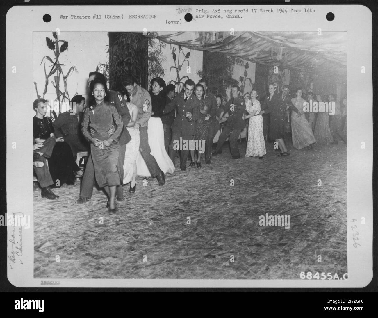 A Conga Line Is UnderWay At A Dance Arranged By The American Red Cross