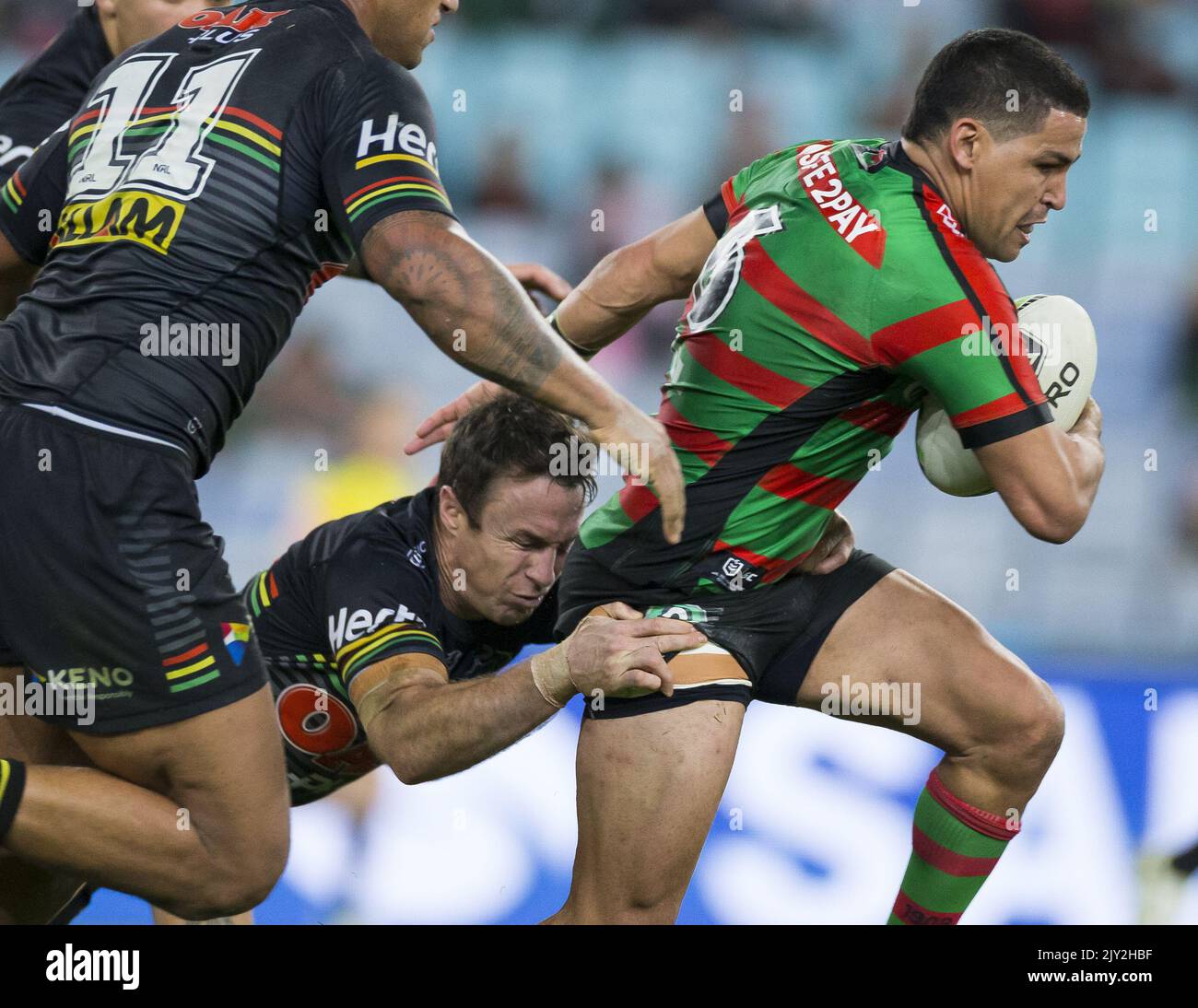 James Maloney of the Panthers tackles Cody Walker of the Rabbitohs