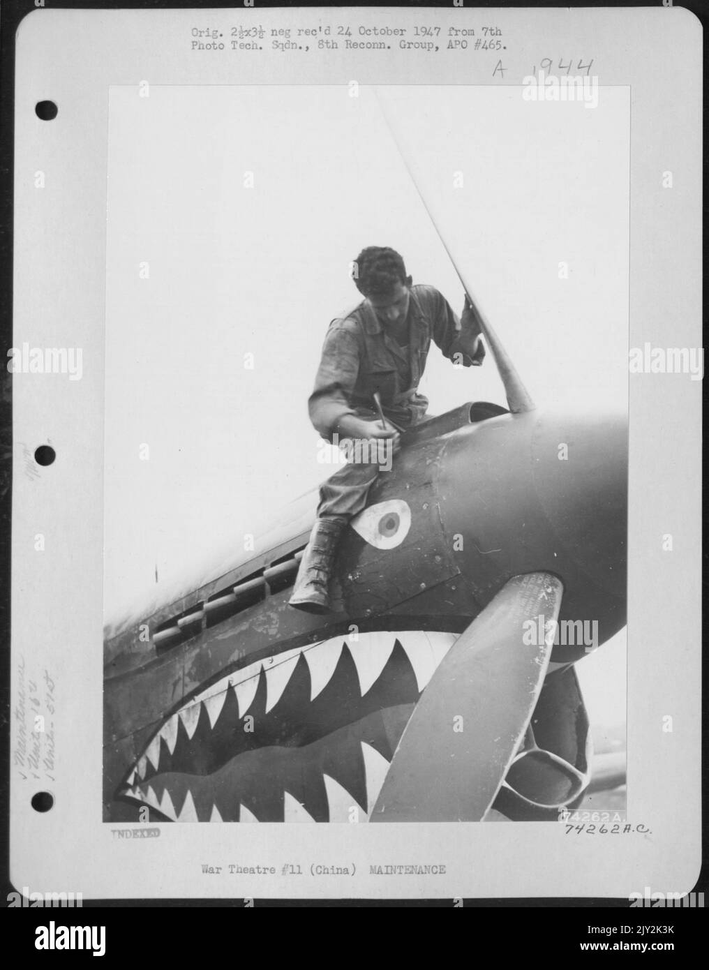 A Curtiss P-40 Of The 16Th Fighter Squadron, 51St Fighter Group, Is Serviced At Peishihwa, China. 19 October 1942. Stock Photo