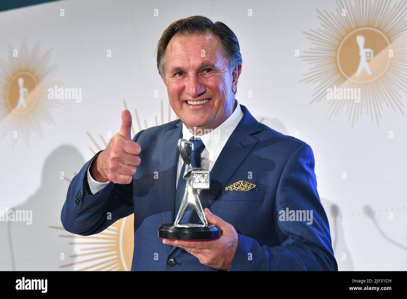 Frankie J. Holden poses for a photograph with the Logie for the most