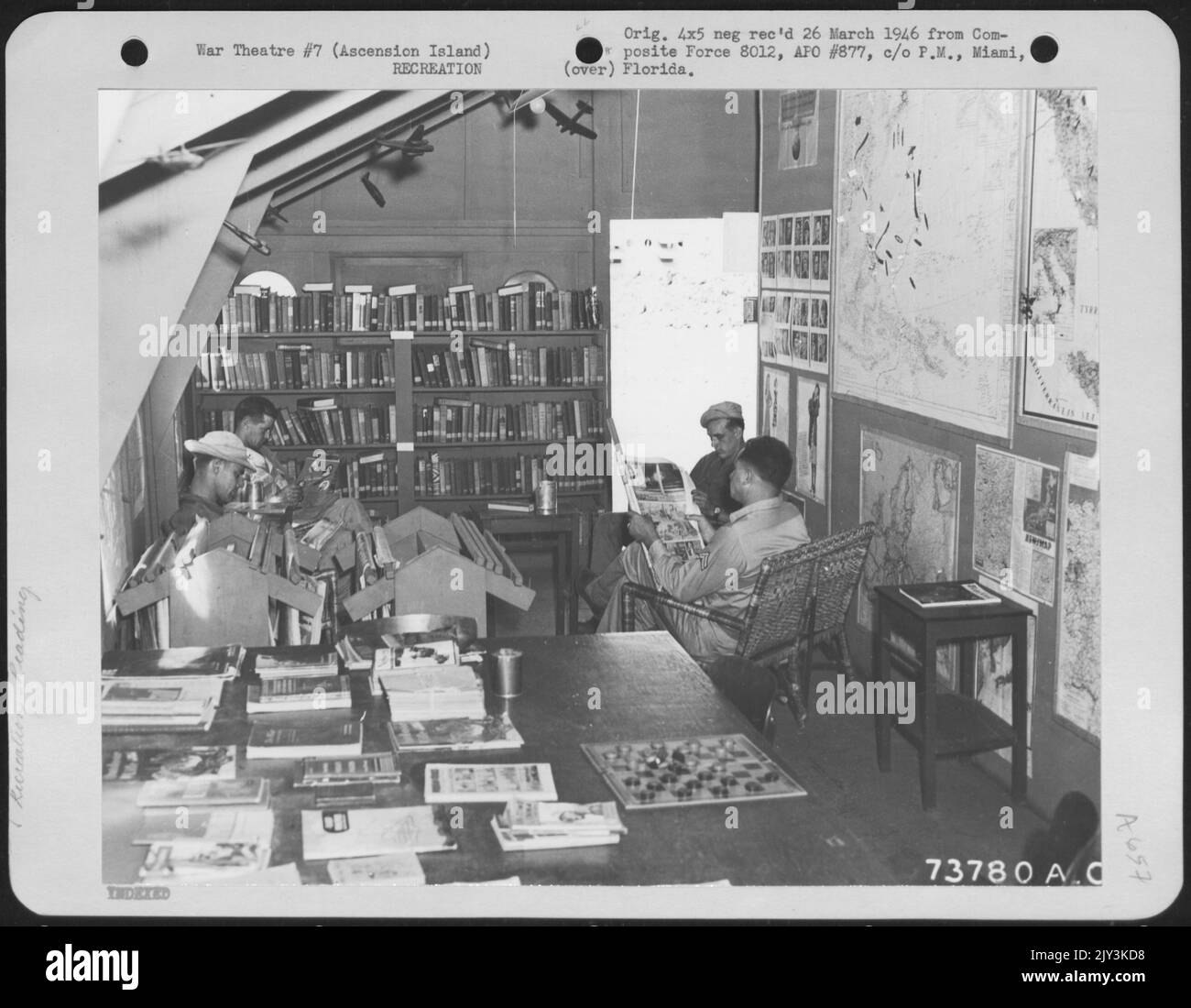 G.I.'s Stationed On Ascension Island, Enjoy A Bit Of Reading In The Library Furnished By The Special Services. 12 January 1945. Stock Photo