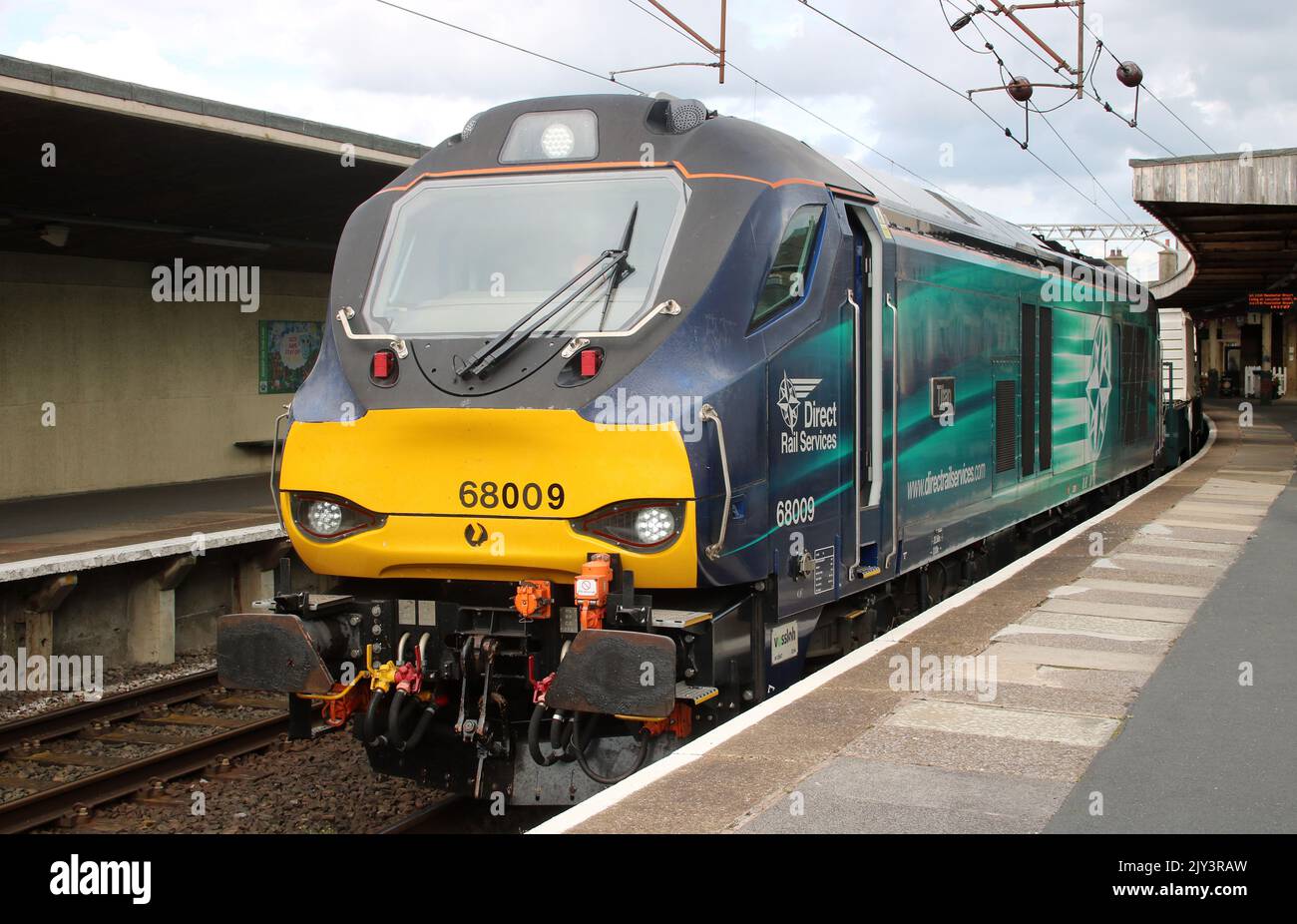Direct Rail Services class 68 UK Light diesel-electric loco 68009 in platform 1 at Carnforth station on 7th September 2022 with nuclear flask  train. Stock Photo
