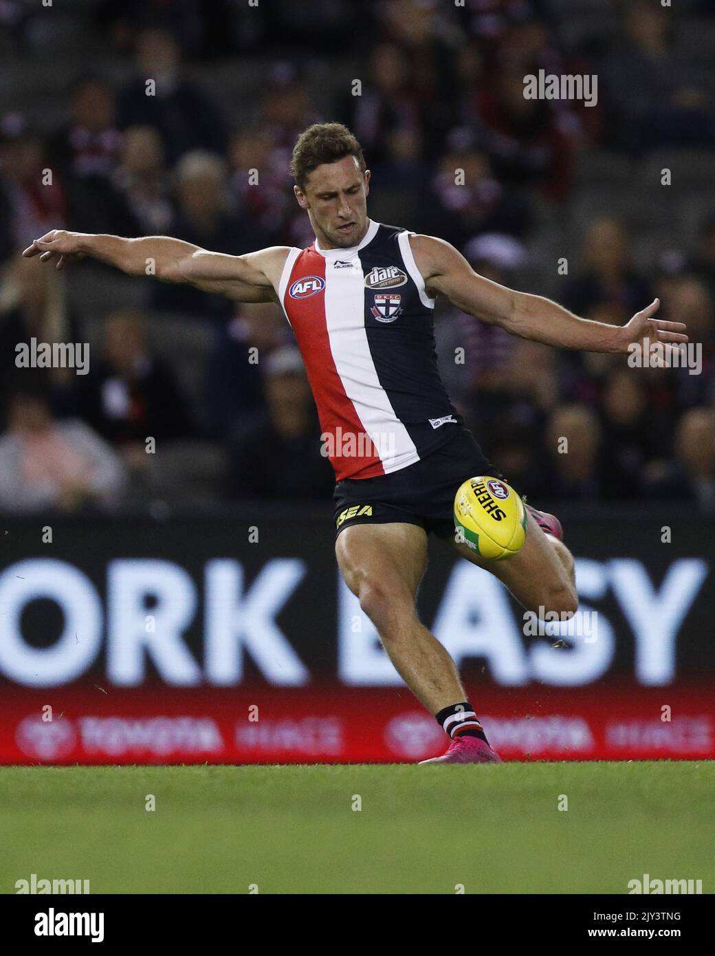 Luke Dunstan of the Saints kicks the ball during the Round 19 AFL match ...