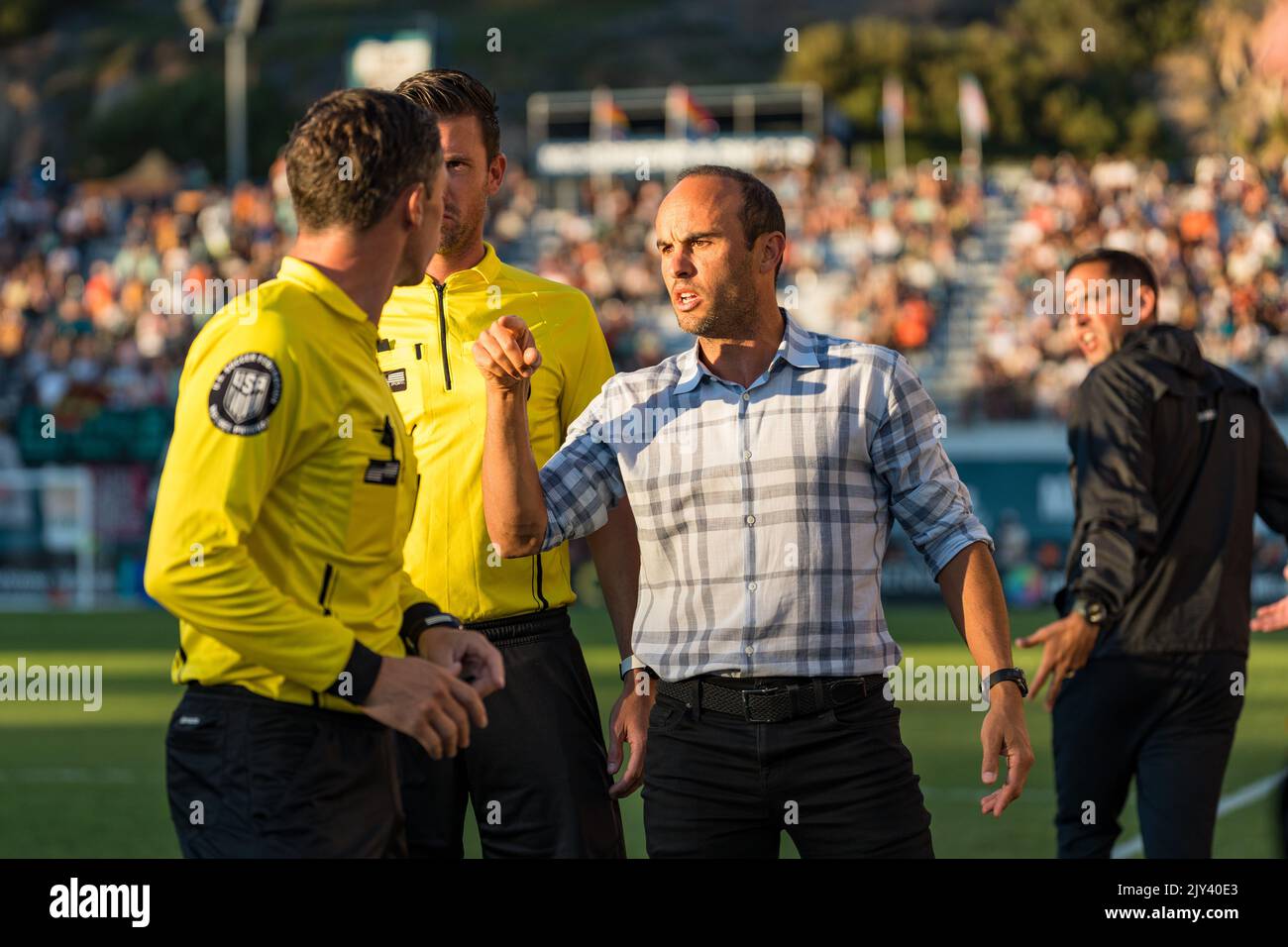 San Diego Loyal manager Landon Donovan argues with the official over a