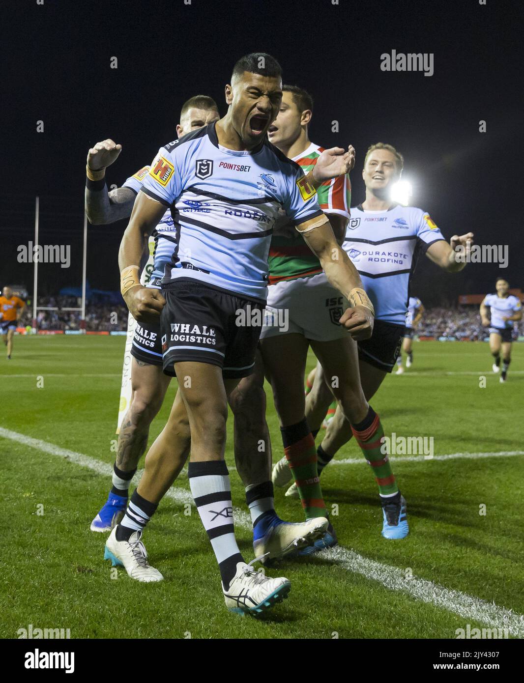 Ronaldo Mulitalo of the Sharks scores during the Round 20 NRL match between the Cronulla Sharks